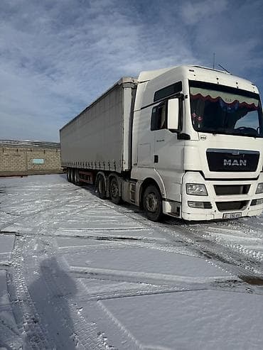 юуто трактор: Тягач, MAN, 2013 г., Тентованный — 1