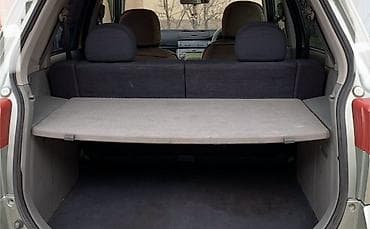 мазда демио решетка: Полка багажника для Mazda Demio. - Оригинальная полка‑шторка — 2