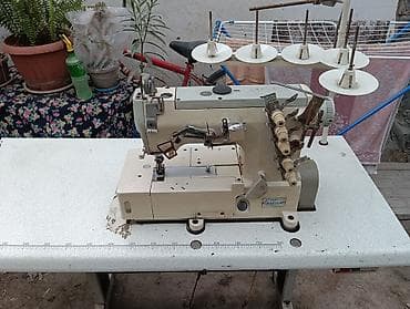 Промышленная швейная машина-оверлок/распошив с рабочим столом. - Тип