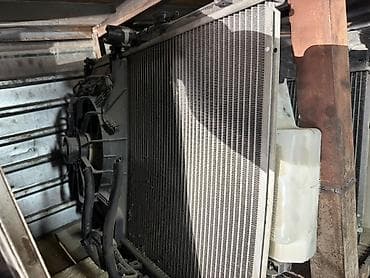 Радиатор системы охлаждения автомобиля с электрическим вентилятором и at lalafo.kg Радиатор системы охлаждения автомобиля с электрическим вентилятором и