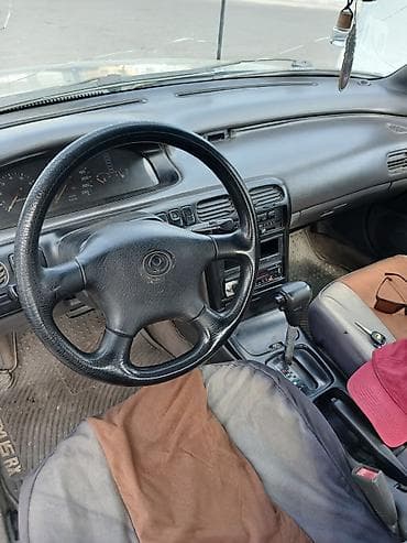 мереке авто слив: Mazda Cronos: 1993 г., 2 л, Автомат, Бензин, Седан — 7