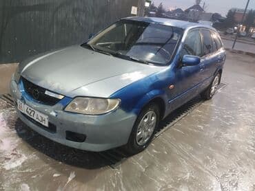 авто пулт: Mazda 323: 2001 г., Бензин, Хэтчбэк — 1