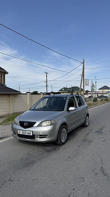 Mazda Demio: 2004 г., 1.5 л, Автомат, Бензин, Хэтчбэк — 1