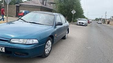 волчок 124: Mazda 626: 1993 г., 1.8 л, Механика, Бензин, Седан — 1