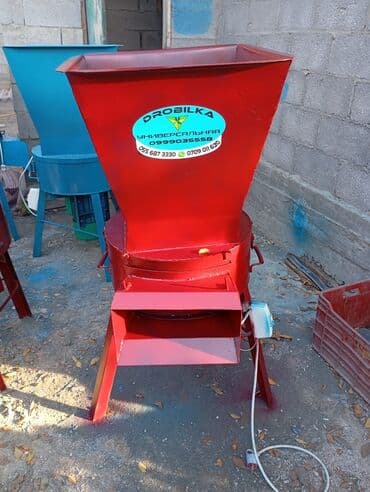 Универсальная электрическая дробилка для зерна и кормов. Описание: -