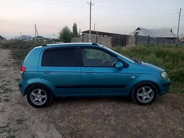 салон для машины: Hyundai Getz: 2003 г., Хэтчбэк — 6