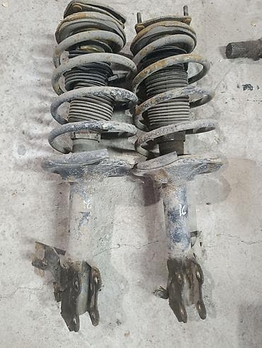 Nissan Almera N16 Ниссан Алмера н16 2000г Амортизаторы передние цена