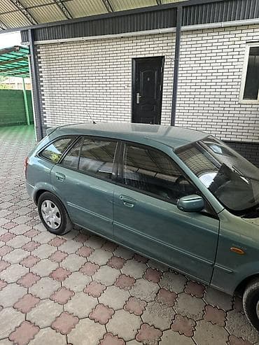 радар авто: Mazda 323: 2001 г., 1.6 л, Автомат, Бензин, Универсал — 6