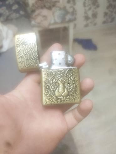 Күйгүзгүчтөр: Бензиновая зажигалка в классическом форм‑факторе (flip-top). - Корпус — 2