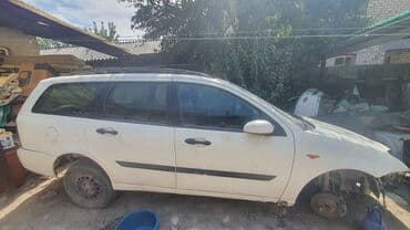 машина б у: Ford Focus: 2001 г., 1.8 л, Механика, Дизель, Универсал — 3