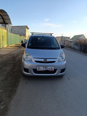 купить авто в кредит без первоначального взноса: Daihatsu Cuore: 2009 г., 1 л, Механика, Бензиновая, Хэтчбэк — 1