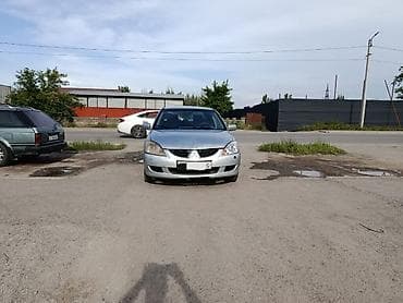9: Mitsubishi Lancer: 2004 г., 1.6 л, Автомат, Бензин, Седан — 6