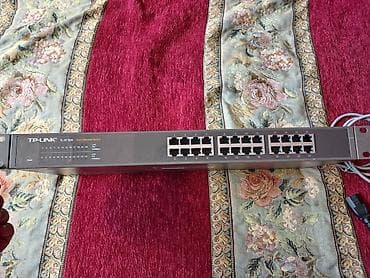 deco e4: Коммутатор TP-Link TL-SF1024, 19-дюймовый стоечный, 24 порта 10/100M — 2