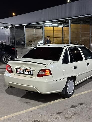 Daewoo Nexia: 2012 г., 1.5 л, Механика, Газ, Седан — 5