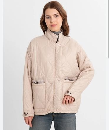 женская одежда куртки: Стёганая женская куртка свободного кроя. Особенности: - Прямой — 2