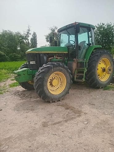 исеки трактор: Трактор John Deere 7800 с навесным корнеуборочным комбайном Amity — 3