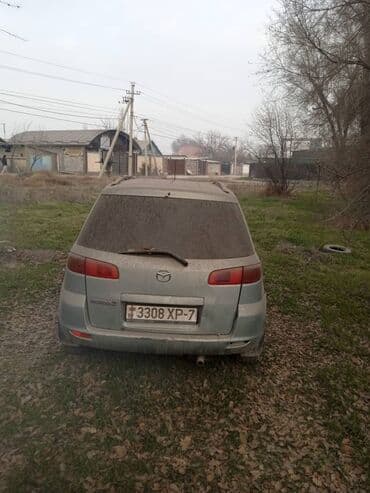 купить нексия 2: Mazda 2: 2005 г., 1.5 л, Автомат, Хэтчбэк — 4