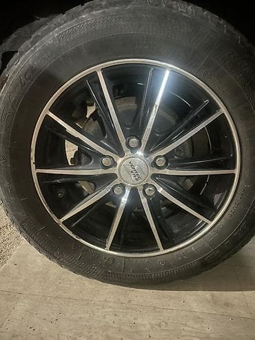 цепи для колёс: Колесо в сборе: шина 195/65 R15 91T на литом диске - Размер шины — 2