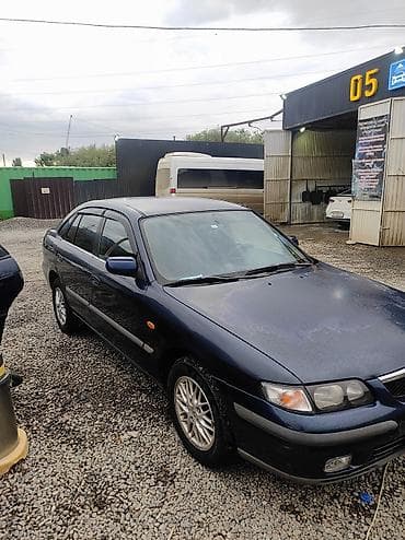 панель 211: Mazda 626: 1999 г., 2 л, Механика, Бензин, Седан — 4