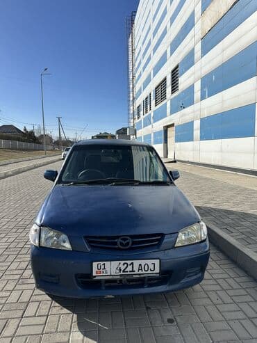 крыло нексия 1: Mazda Demio: 2001 г., 1.3 л, Автомат, Бензиновая, Хэтчбэк — 6