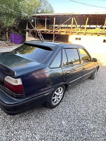 Унаа: Daewoo Nexia: 2006 г., 1.5 л, Кол менен иштөөчү, Бензин, Седан — 3