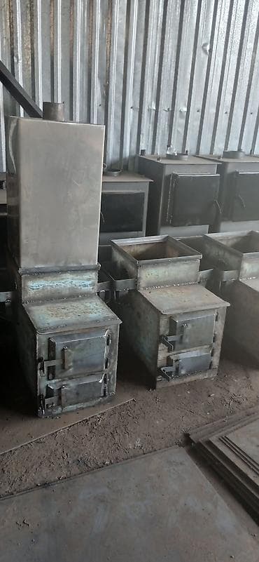 газовые настенные котлы: Твердотопливная печь-водогрей (буржуйка с баком) Описание: - — 2