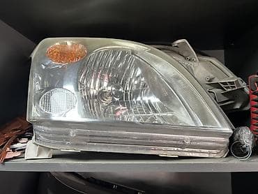 subaru oudbek: Передняя левая фара Toyota — 1