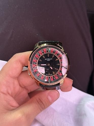 Аксессуары: Часы Jacob & Co Genève, модель с фирменным «рулеточным» безелем — 1