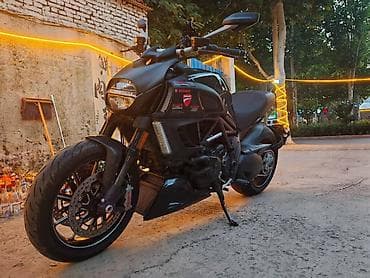 спортивные мотоциклы ducati: Ducati Diavel (чёрный матовый) — мощный крузер/родстер с фирменной — 2