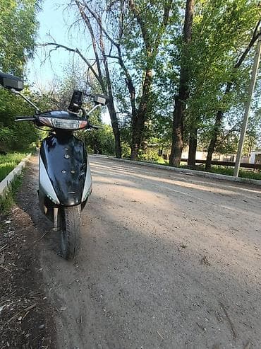 Скутеры: Скутер Honda Dio (2-тактный, 50 см³) Описание: - Городской скутер — 4