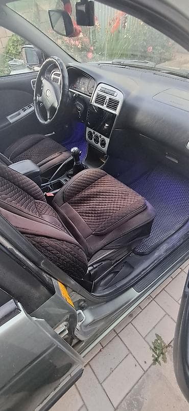 Toyota Avensis: 2003 г., 1.8 л, Механика, Универсал — 1