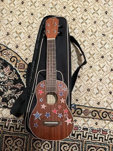 Музыкалык аспаптар: Укулеле TOM с чехлом - Тип: сопрано (4 струны) - Корпус: натуральное — 1