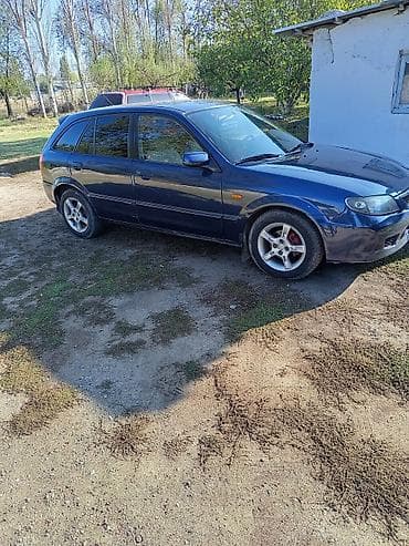 шоха бишкек: Mazda 323: 2003 г., 1.6 л, Механика, Бензин, Хэтчбэк — 3