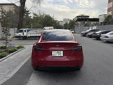 byd e2 2023: Tesla Model Y: 2020 г. — 6