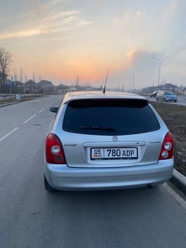 крыло нексия 1: Mazda 323: 2002 г., 1.6 л, Механика, Бензиновая, Хэтчбэк — 4