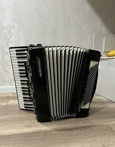 Комузы: Аккордеон Weltmeister, классическая немецкая модель в чёрном корпусе — 1