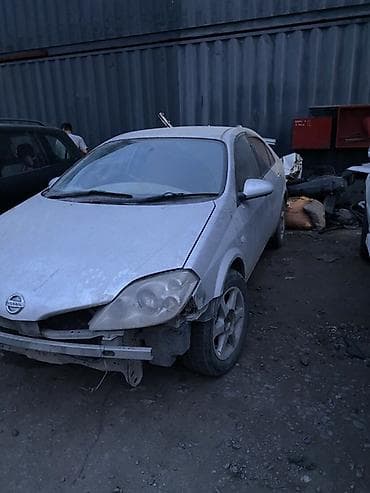 Транспорт: Nissan Primera (P12), серебристый хэтчбек/лифтбек, разбирается на — 2