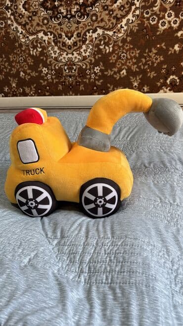 Оюнчуктар: Игрушка трактор большая,мягкая,новая.Длина 40см высота 38см. Отличное — 3