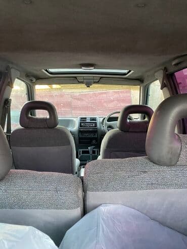 нисан саани: Внедорожник 5‑дверный, цвет сине‑бежевый (двухцветный кузов) — 4