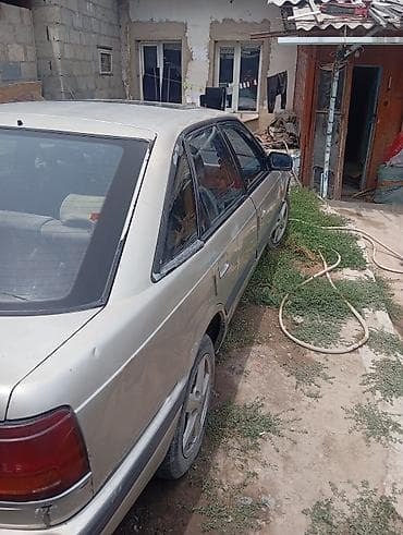 Унаа: Mazda 626: 1991 г., 2 л, Кол менен иштөөчү, Бензин, Хетчбек — 2