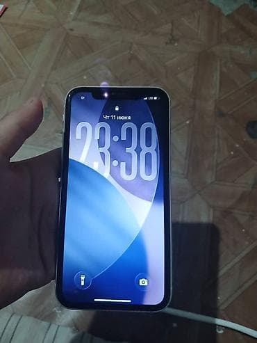 Смартфон Apple iPhone (белый), 64 ГБ. Особенности: - Экран с вырезом — 1