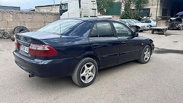 124 e500: Mazda 626: 2000 г., 2 л, Механика, Бензин, Седан — 3