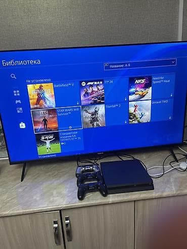 плэйстейшен 4: Игровая консоль Sony PlayStation 4 Slim (черная) с двумя беспроводными — 2