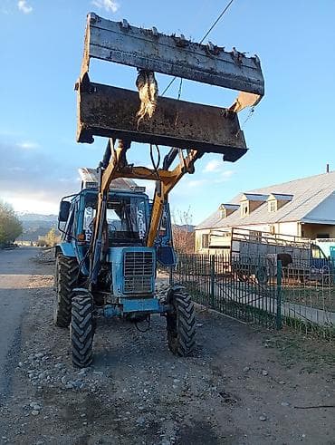 мтз 1222: Фронтальный погрузчик на базе колёсного трактора - Колёсная формула — 2