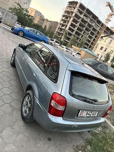 Продажа авто: Mazda Familia: 2002 г., 1.6 л, Механика, Бензин, Хэтчбэк — 5