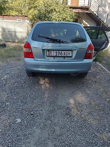 mazda 121: Mazda Familia: 2002 г., 1.5 л, Автомат, Бензин, Универсал — 5