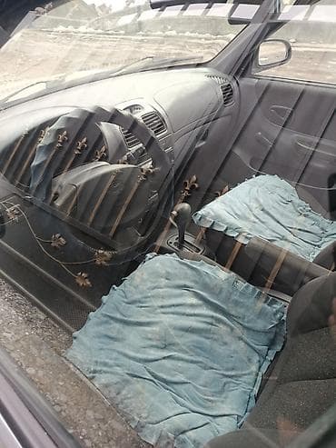 lancer evo: Седан серебристого цвета, компактный и экономичный. Кузов 4‑дверный — 6