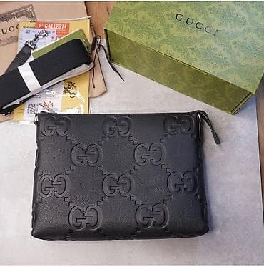 сумку и клатч: Сумка-клатч Gucci из чёрной зернёной кожи с тиснённым монограммным — 1