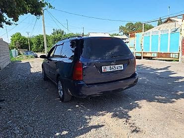 x treil: Ford Focus: 2001 г., 1.6 л, Механика, Газ, Универсал — 5