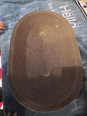 Она выполнена из плотно свернутого гофрированного картона, уложенного — 1